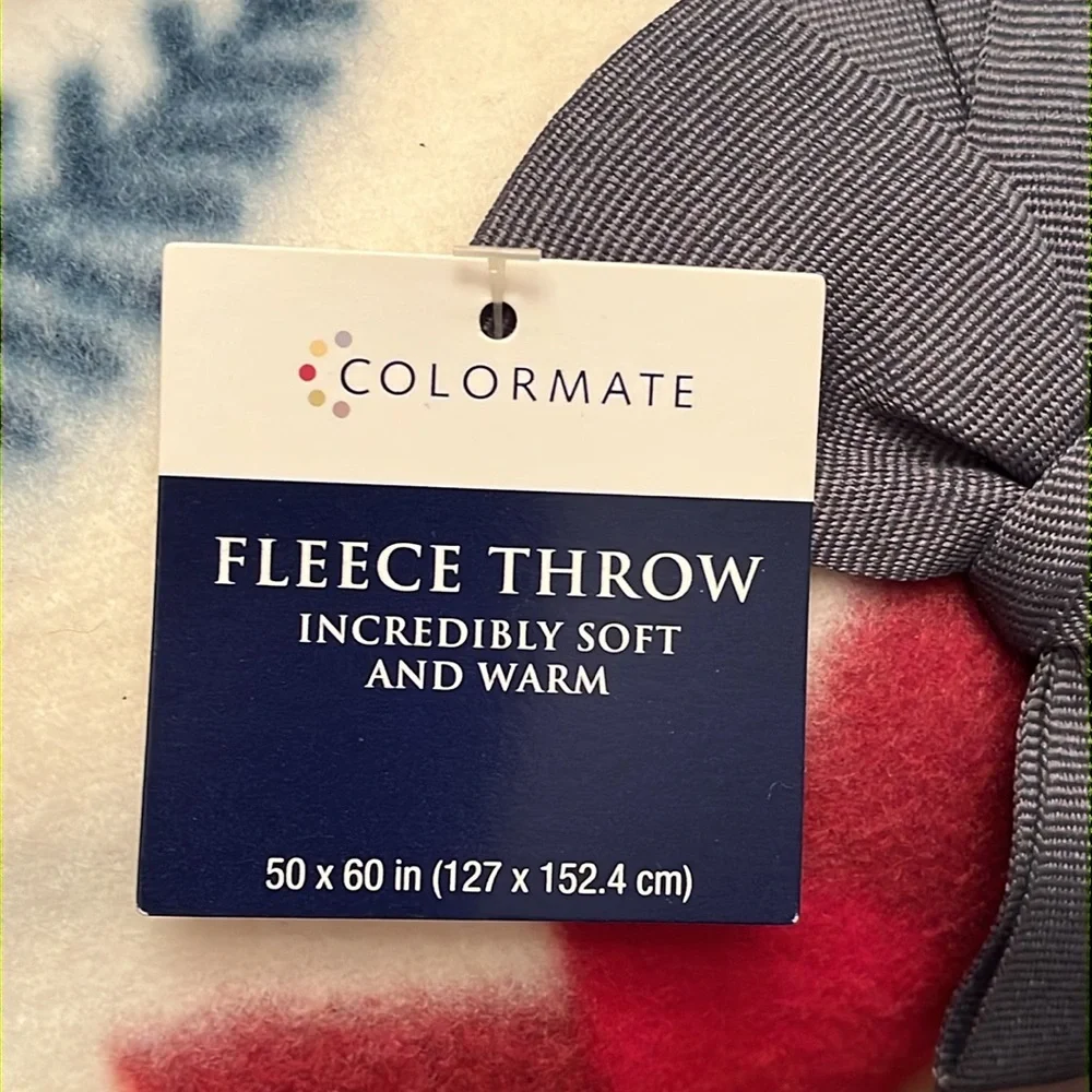 NWT Holiday fleece throw blanket featuring poinsettias, from Colormate